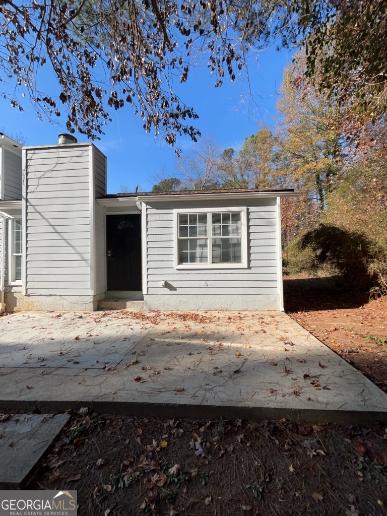 1682 Charmeth Road Lithonia, GA 30058 - Photo 50 of 52 a backyard of a house