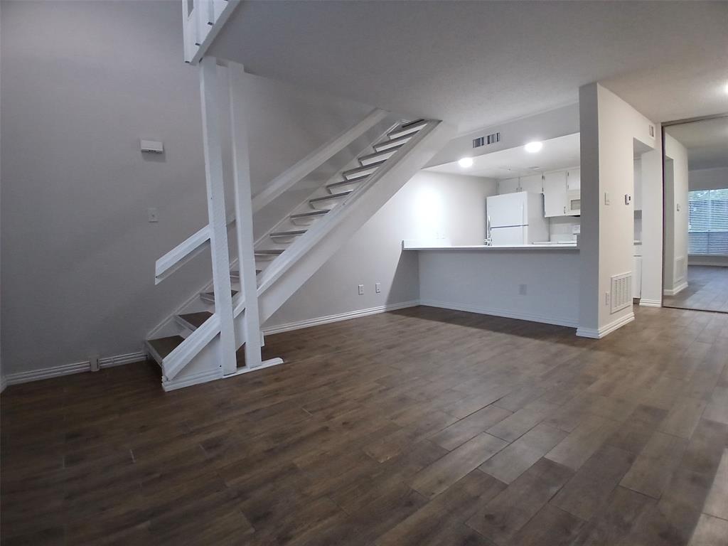 4640 Country Creek Drive, Unit 1257 Dallas, TX 75236 - Photo 3 of 11 a view of entryway and hall with wooden floor