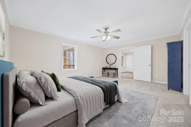 a living room with furniture and flat screen tv