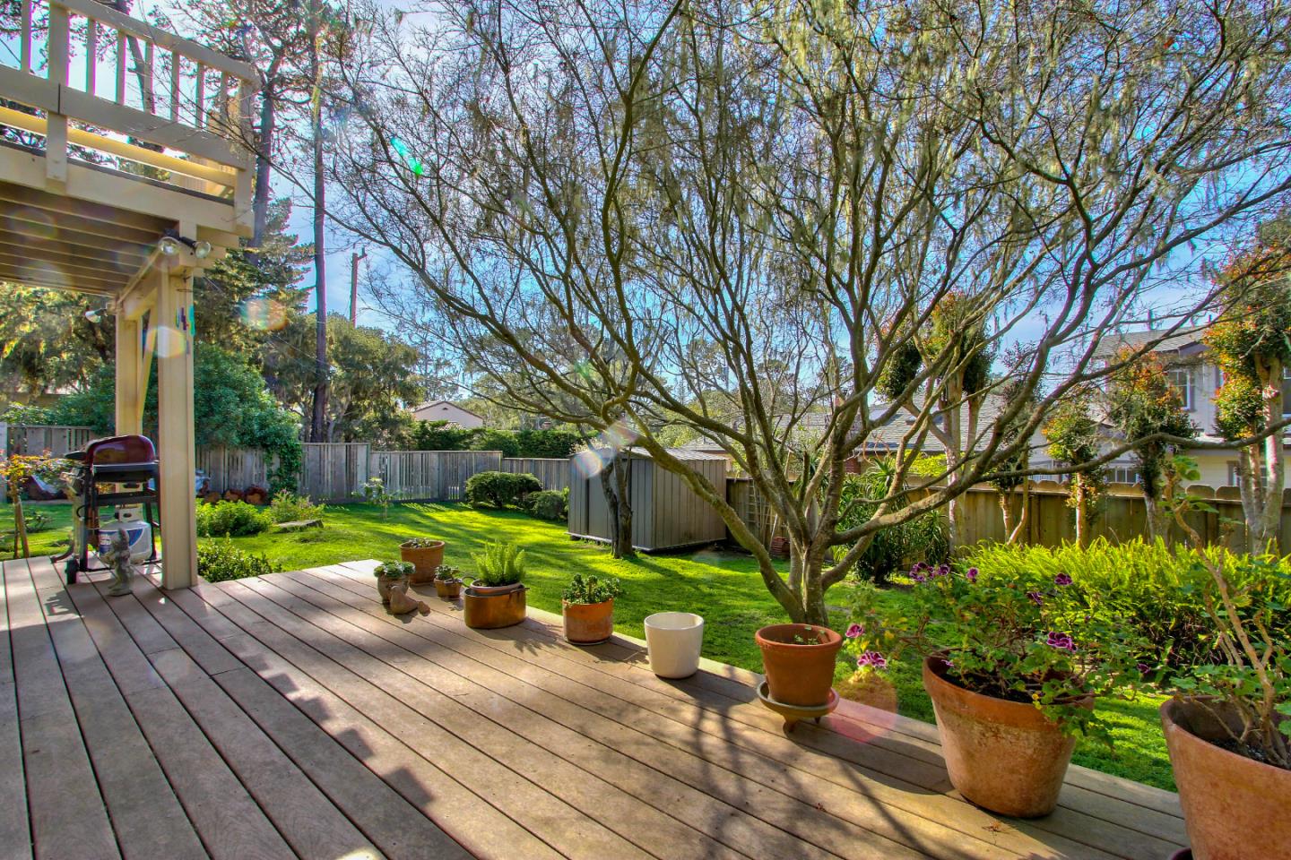 3036 Sloat Road Pebble Beach, CA 93953 - Photo 11 of 22 a view of a backyard with sitting area