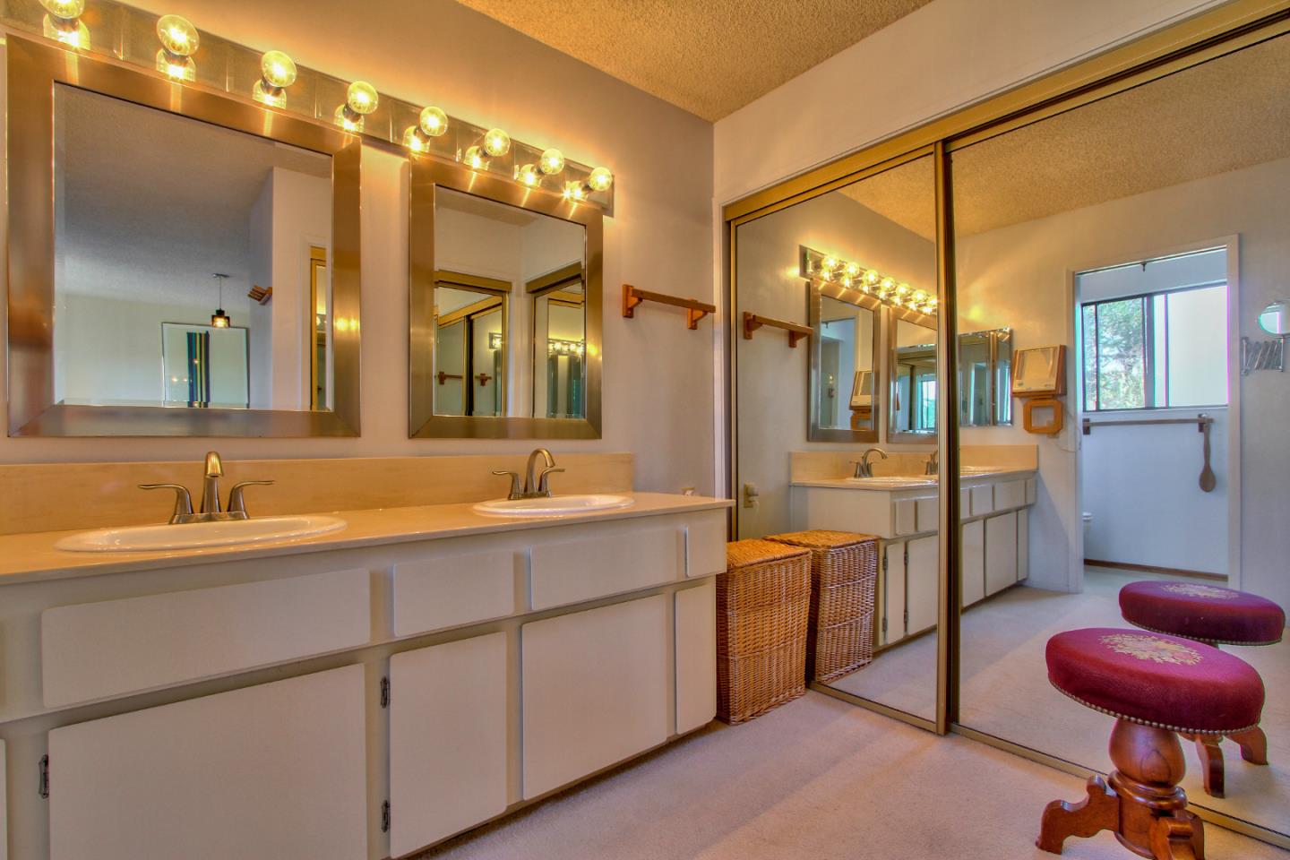 3036 Sloat Road Pebble Beach, CA 93953 - Photo 13 of 22 a bathroom with a sink a toilet and shower