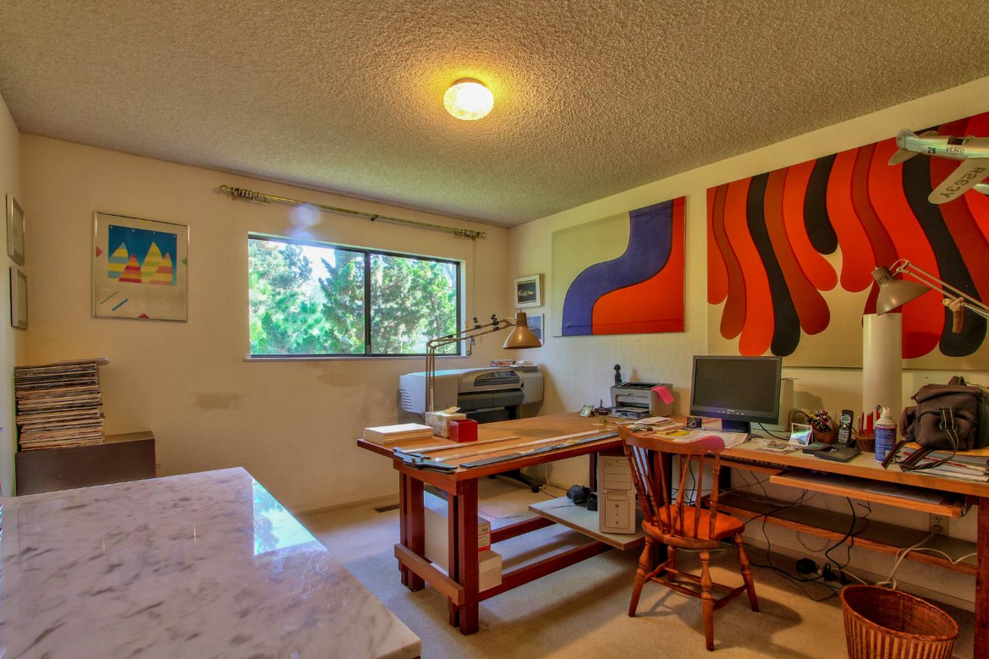 3036 Sloat Road Pebble Beach, CA 93953 - Photo 16 of 22 a living room with furniture pool table and a large window