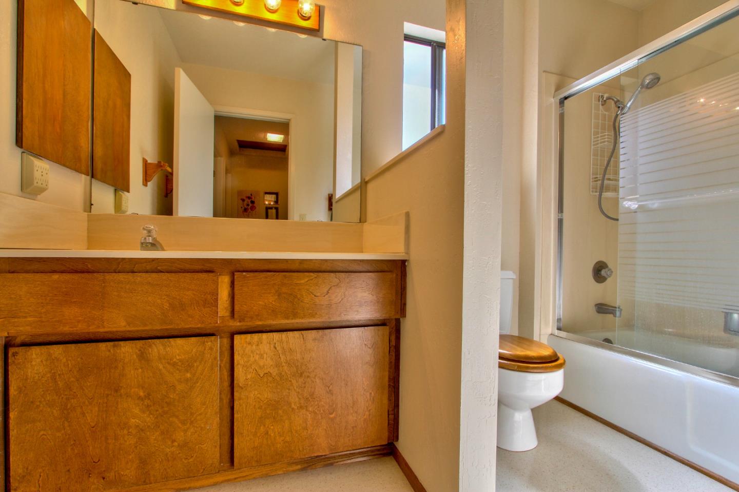 3036 Sloat Road Pebble Beach, CA 93953 - Photo 17 of 22 a bathroom with a bathtub and a toilet