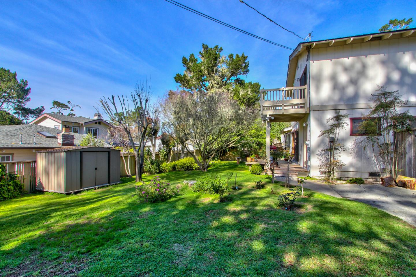 3036 Sloat Road Pebble Beach, CA 93953 - Photo 19 of 22 a view of a house with a yard