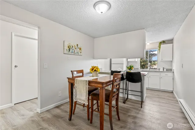 a view of a dining room with furniture
