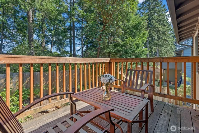 a view of a two chairs in the deck
