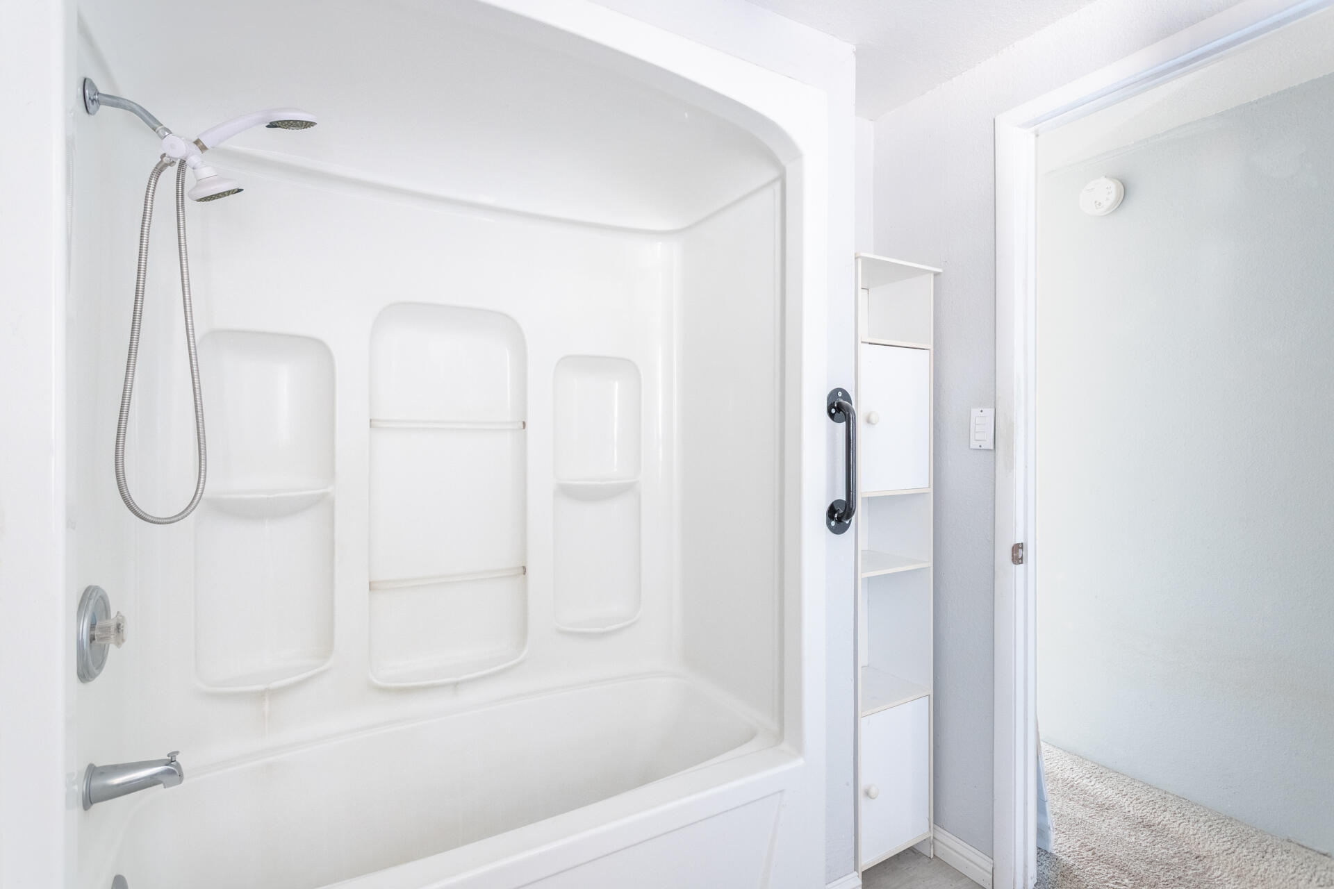 17594 Oly Way Anderson, CA 96007 - Photo 12 of 29 a bathroom with a glass shower door