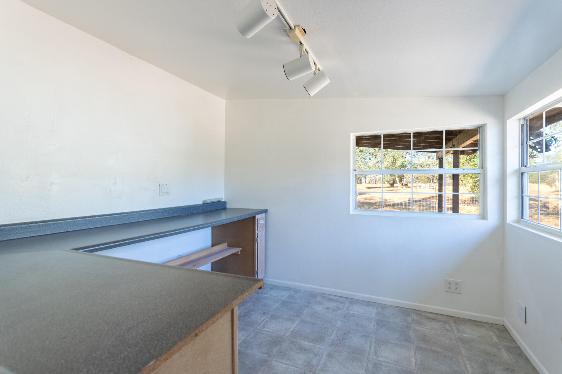 17594 Oly Way Anderson, CA 96007 - Photo 15 of 29 an empty room with windows