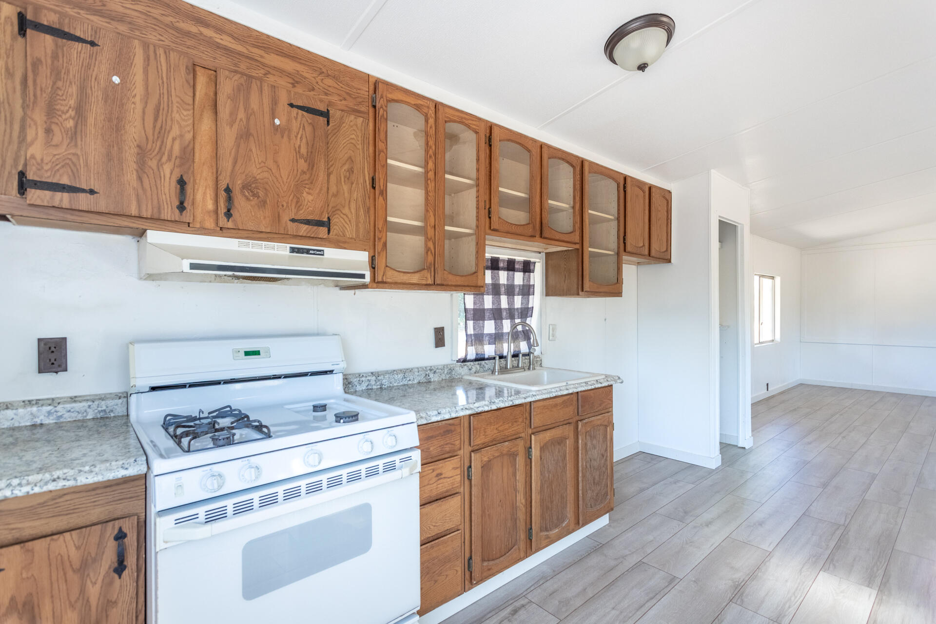 17594 Oly Way Anderson, CA 96007 - Photo 18 of 29 a kitchen with a stove and a refrigerator