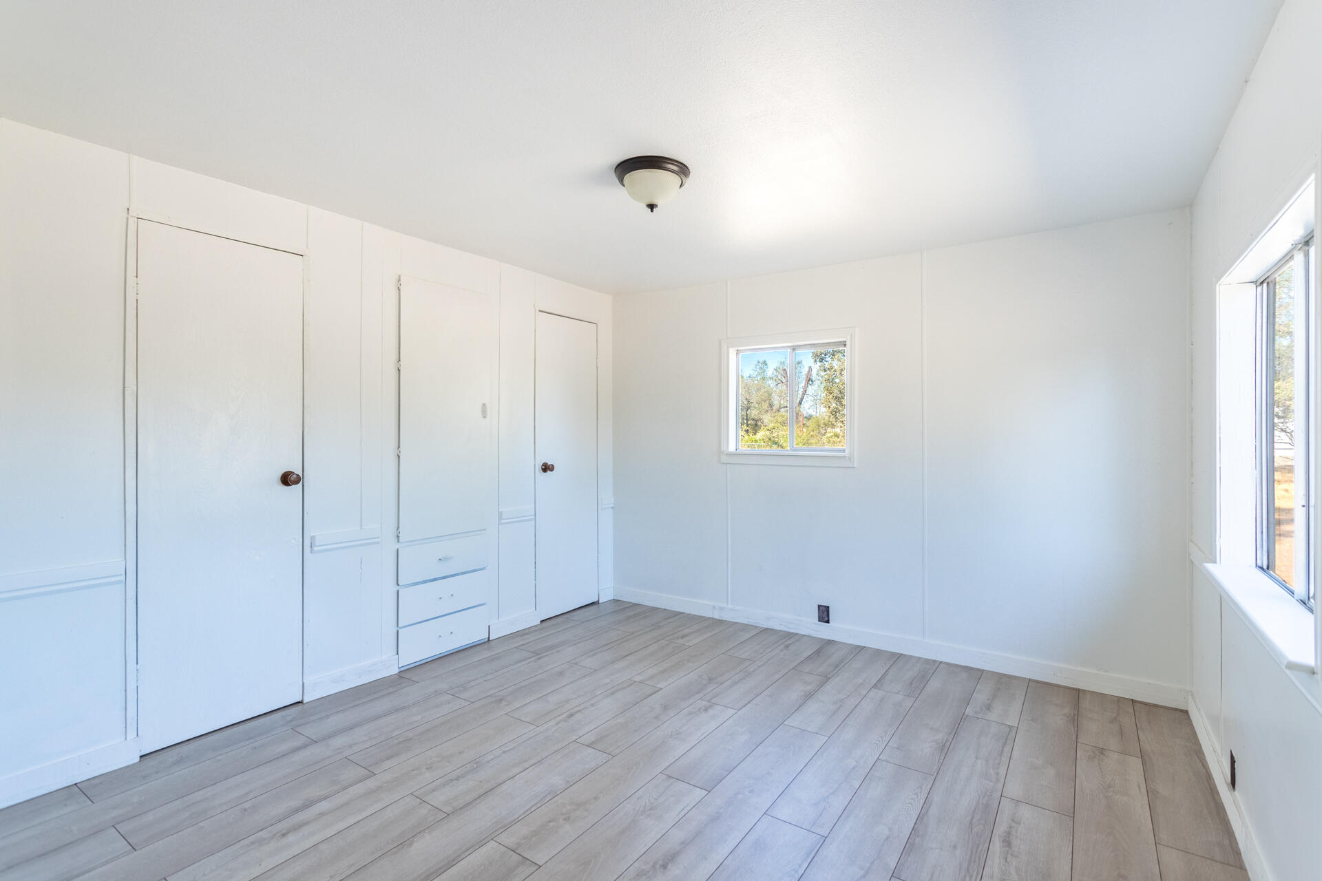 17594 Oly Way Anderson, CA 96007 - Photo 19 of 29 a view of an empty room and window