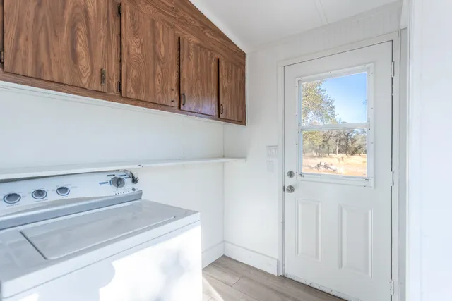a utility room with washer and dryer
