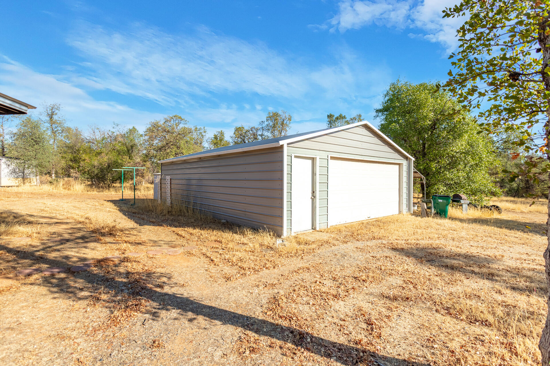 17594 Oly Way Anderson, CA 96007 - Photo 23 of 29 a front view of a house with a yard