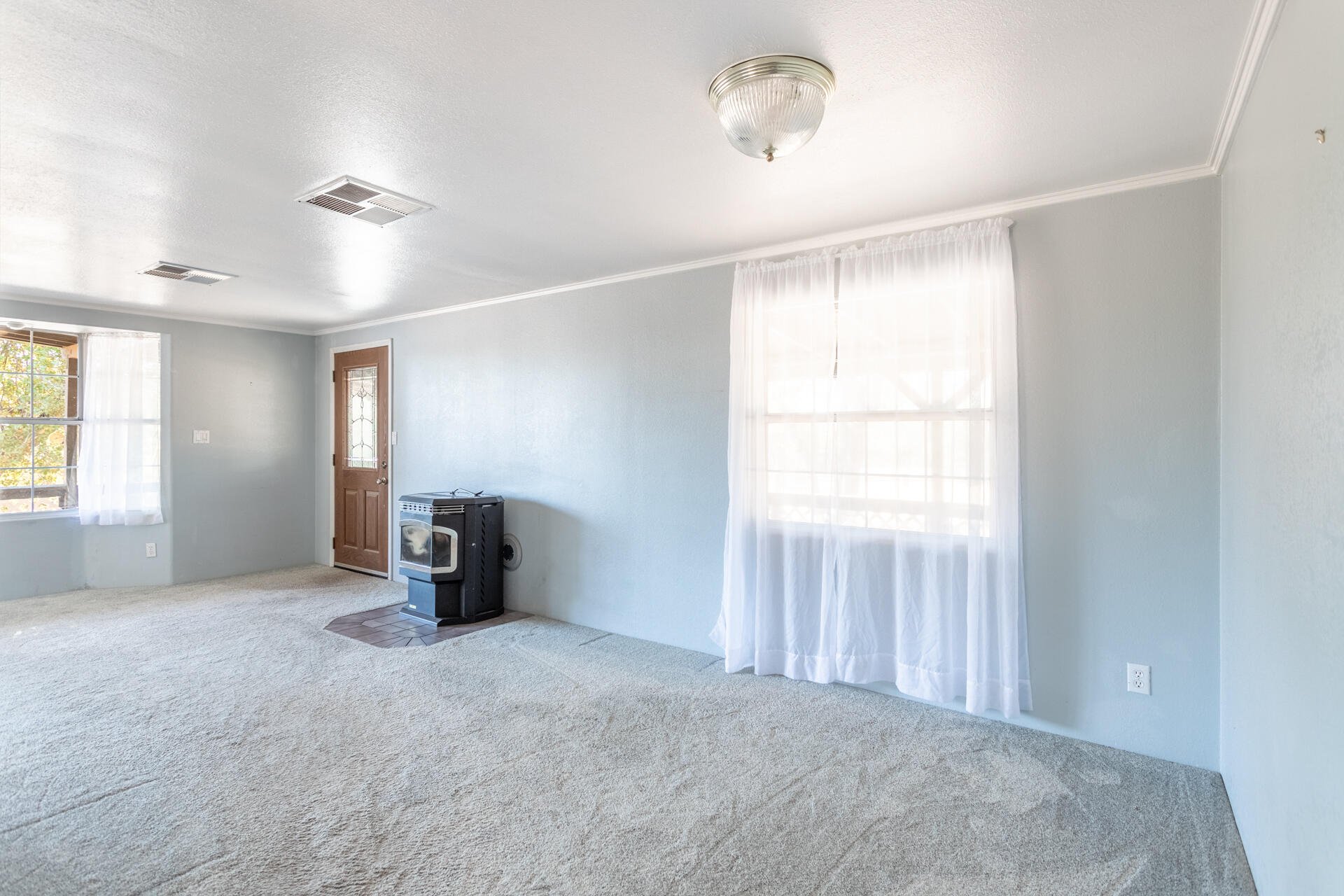 17594 Oly Way Anderson, CA 96007 - Photo 8 of 29 a view of an empty room with a window