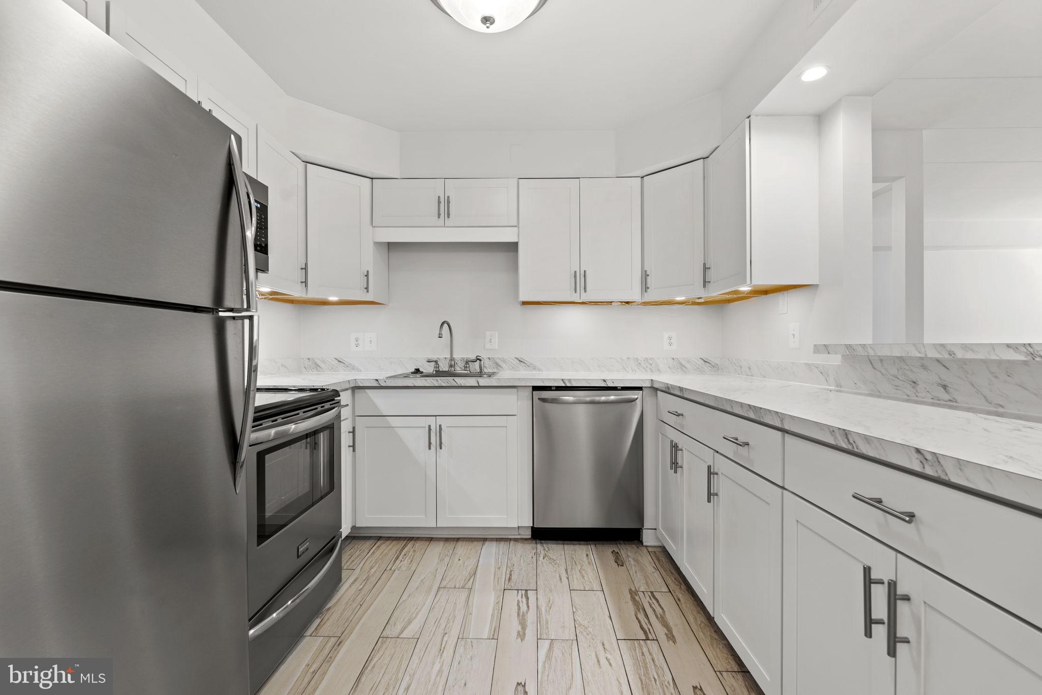 6301 North Charles Street, Unit 101 Baltimore, MD 21212 - Photo 8 of 20 Brand new stainless steel appliances