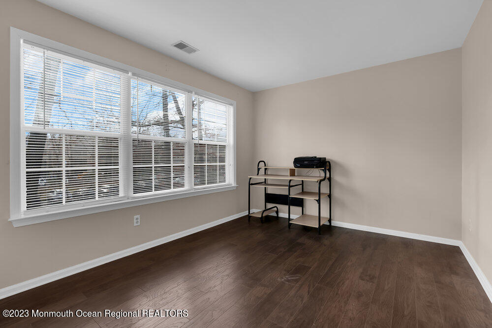 2206 Candlelight Court, Unit 2206 Helmetta, NJ 08828 - Photo 27 of 38 a view of a workspace with furniture and a window