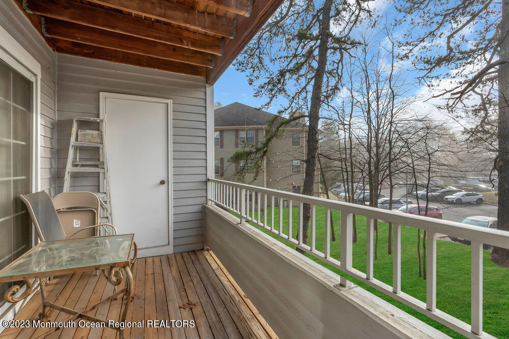 2206 Candlelight Court, Unit 2206 Helmetta, NJ 08828 - Photo 38 of 38 a view of balcony with furniture