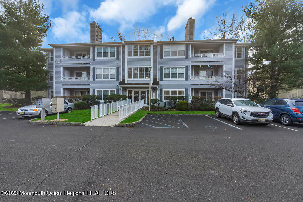 2206 Candlelight Court, Unit 2206 Helmetta, NJ 08828 - Photo 5 of 38 a view of street with parked cars