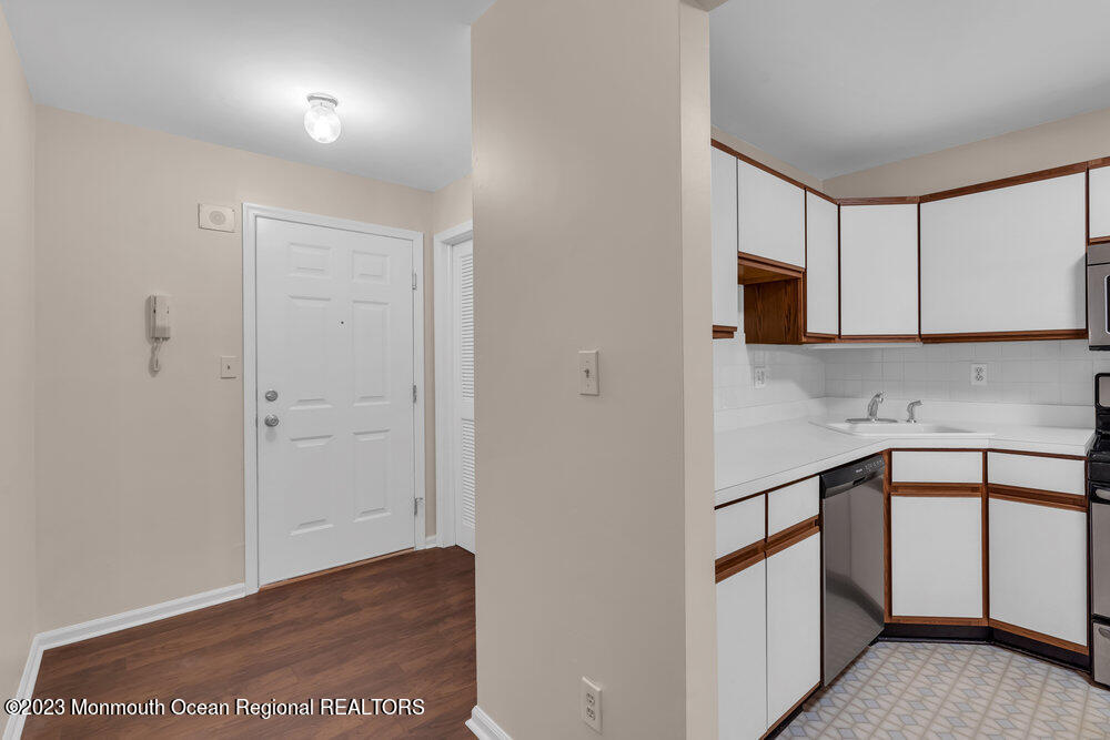 2206 Candlelight Court, Unit 2206 Helmetta, NJ 08828 - Photo 9 of 38 a view of cabinets with wooden floor