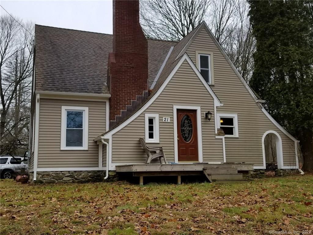21 Judd Road Monroe, CT 06468 - Photo 1 of 1 a front view of a house with a garden
