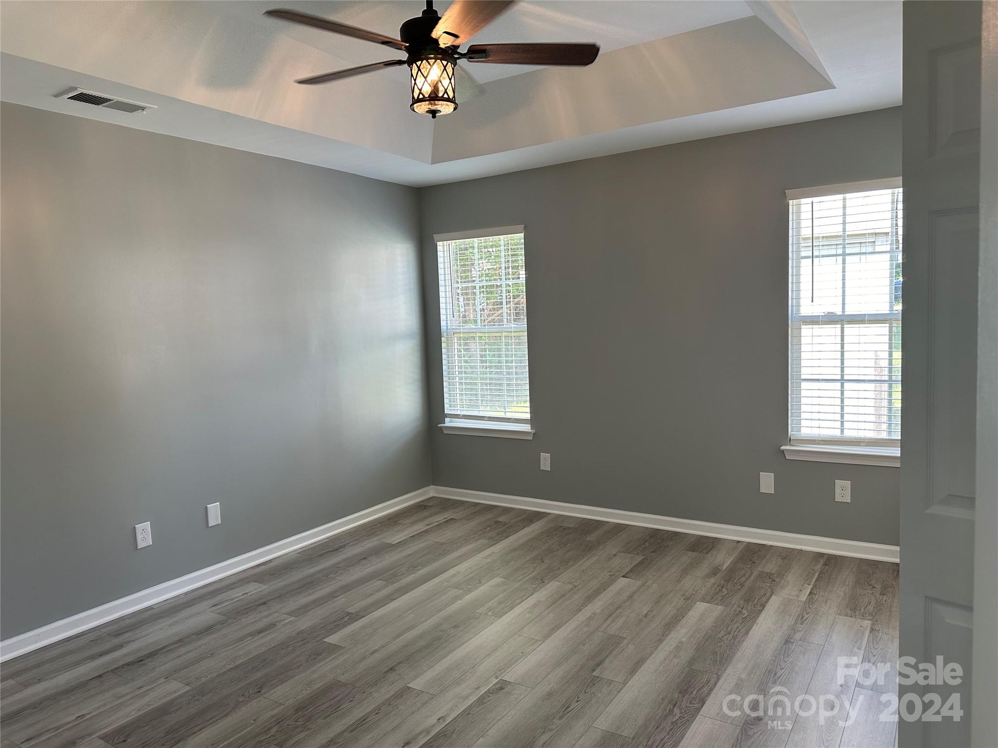 5131 Elizabeth Road Charlotte, NC 28269 - Photo 8 of 28 a view of room with window and ceiling fan