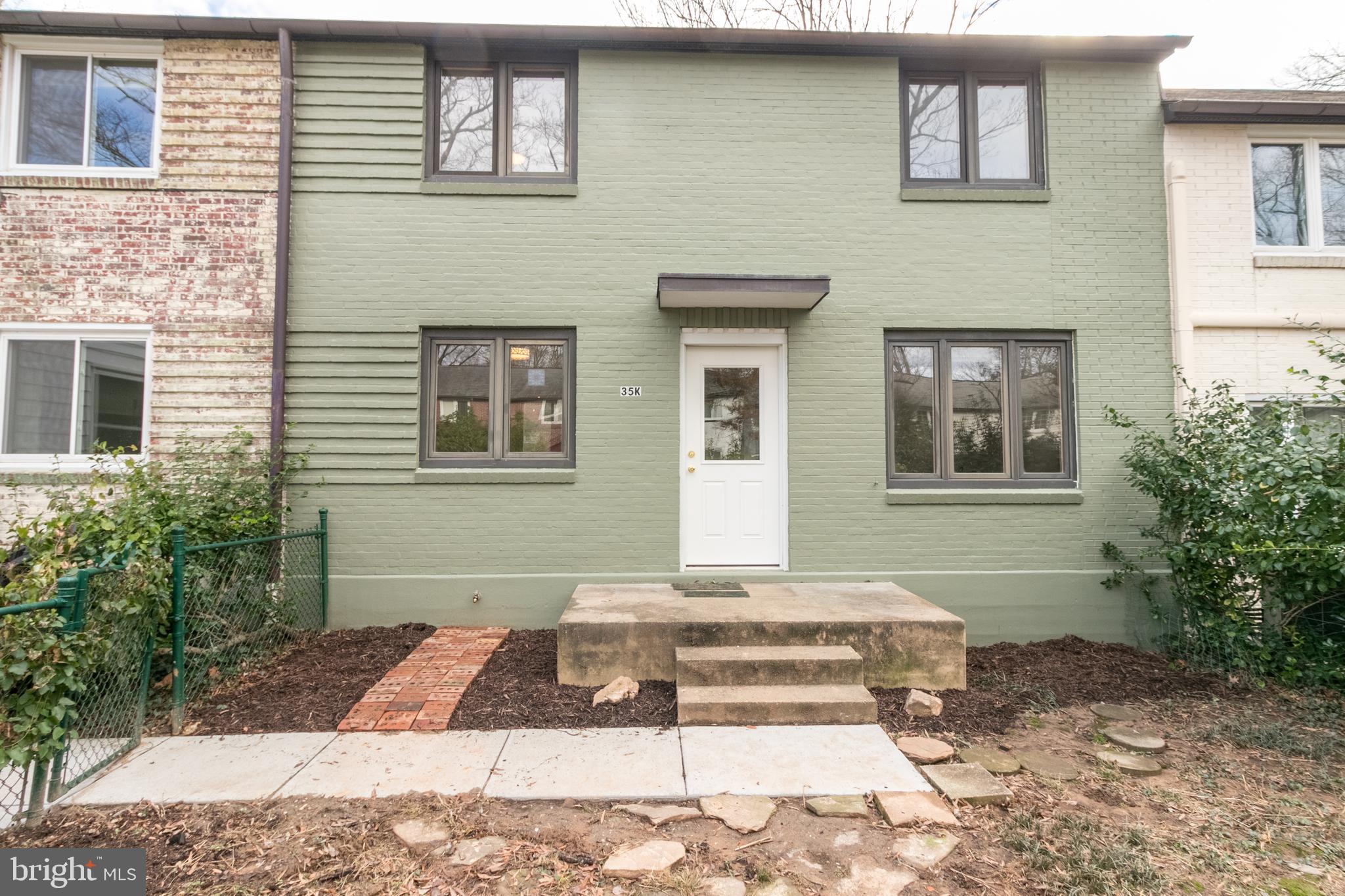 35 Ridge Road, Unit K Greenbelt, MD 20770 - Photo 2 of 18 New paint gives the exterior a fresh look
