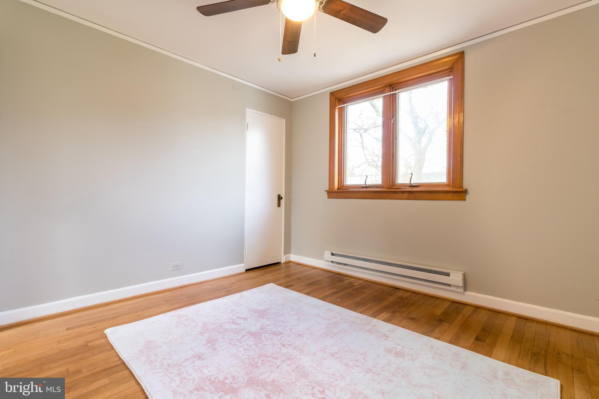 35 Ridge Road, Unit K Greenbelt, MD 20770 - Photo 16 of 18 Bedroom #2 w/ refinished hardwood floors