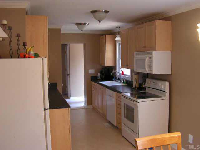 5116 Wickham Road Raleigh, NC 27606 - Photo 4 of 10 Updated kitchen makes preparing meals a pleasure. Other