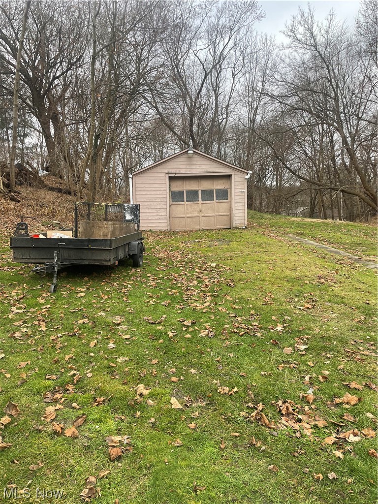 790 Springdale Street Akron, OH 44310 - Photo 2 of 2 View of yard with a garage