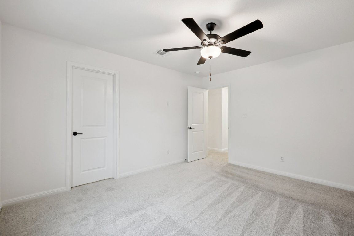 774 Jackson River Loop Kyle, TX 78640 - Photo 14 of 34 a view of an empty room