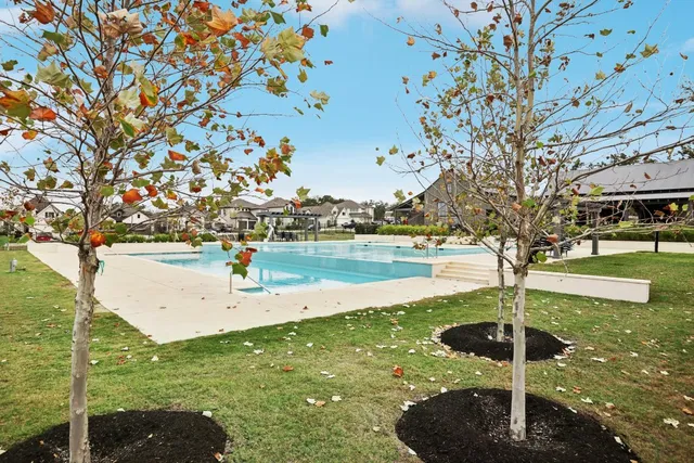 a view of a lake with houses in outdoor space