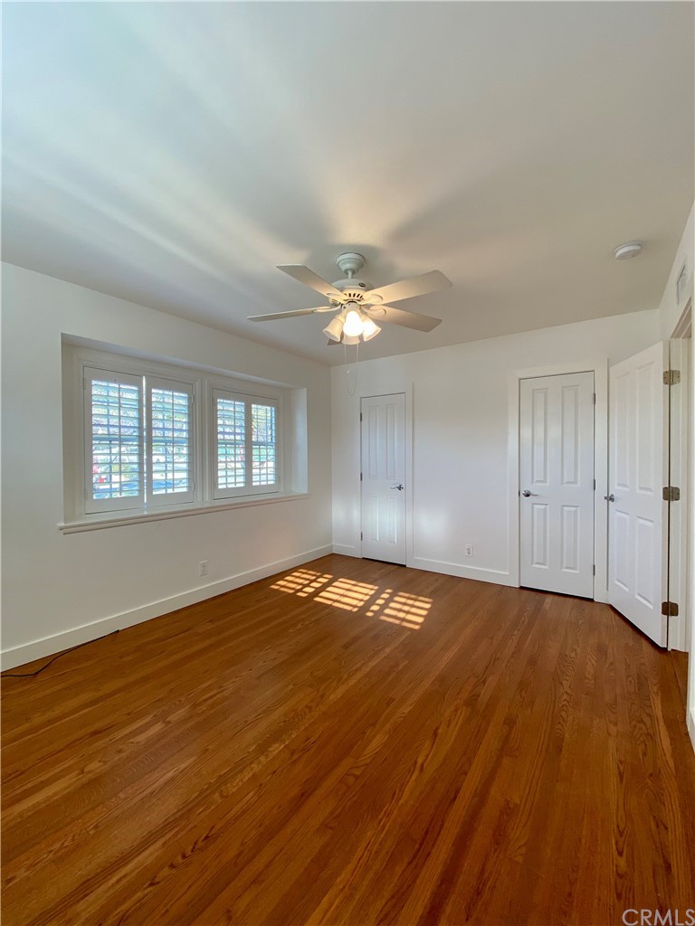 948 Cambridge Drive Burbank, CA 91504 - Photo 24 of 36 a view of an empty room with wooden floor and a window
