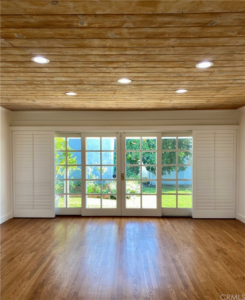 948 Cambridge Drive Burbank, CA 91504 - Photo 3 of 36 a view of empty room with wooden floor and fan