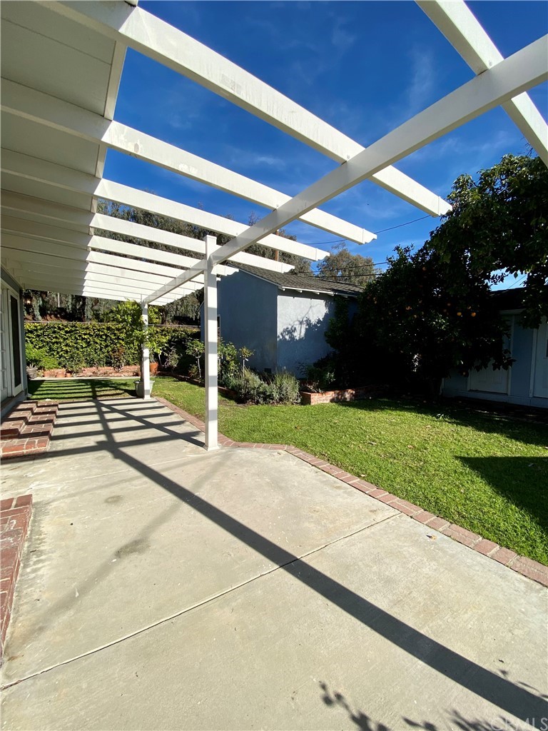948 Cambridge Drive Burbank, CA 91504 - Photo 33 of 36 a view of a house with a yard and garage