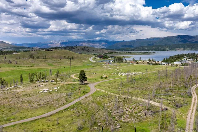 a view of a city with an ocean beach