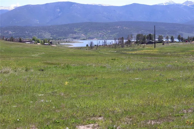 a view of a city with an ocean