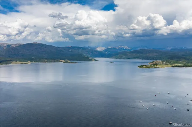 a view of a lake with a city