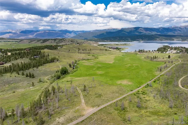 a view of an ocean and a houses
