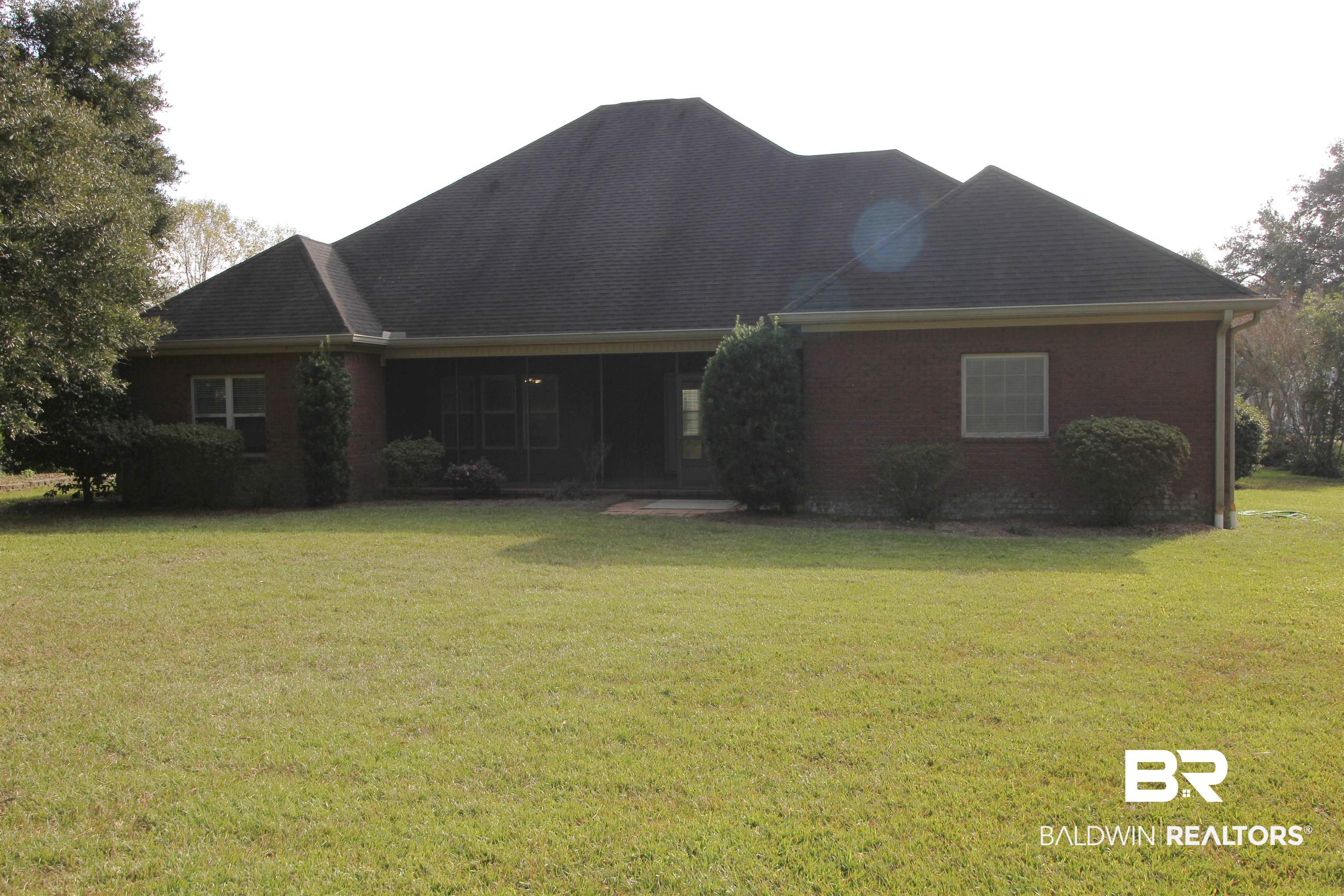 306 South Tee Drive Fairhope, AL 36532 - Photo 6 of 37 Rear view of property with a yard