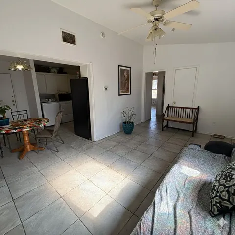 a view of a livingroom with furniture