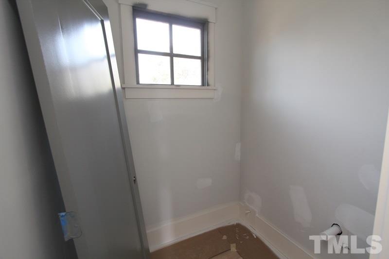 707 South State Street Raleigh, NC 27601 - Photo 11 of 23 an empty room with a window
