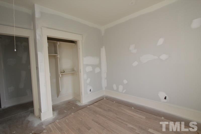 707 South State Street Raleigh, NC 27601 - Photo 13 of 23 wooden floor in an empty room
