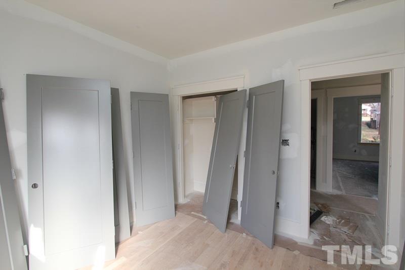 707 South State Street Raleigh, NC 27601 - Photo 20 of 23 a view of a bathroom with a glass door and shower