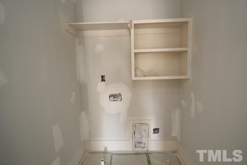 707 South State Street Raleigh, NC 27601 - Photo 22 of 23 a view of walk in closet with empty racks