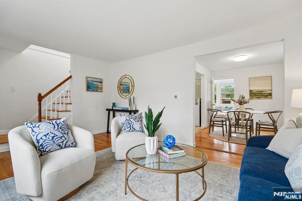 26 Rutgers Place Bloomfield, NJ 07003 - Photo 2 of 38 a living room with furniture potted plant and wooden floor