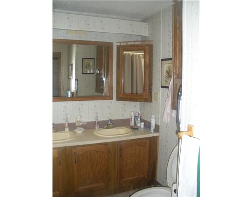 36 Lane F Coventry, RI 02816 - Photo 9 of 12 Master Bath/Spa. Spacious bathroom with double sinks.