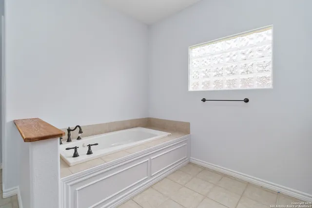 a bathroom with a bathtub