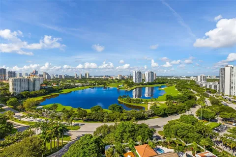 a view of a city with lawn chairs