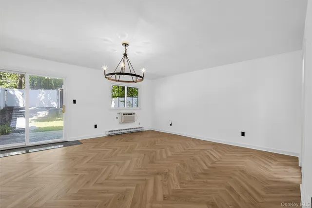 a view of an empty room and window