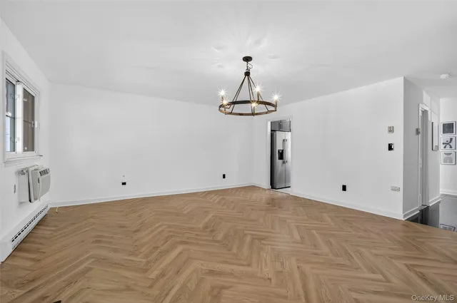 a view of a room with a chandelier