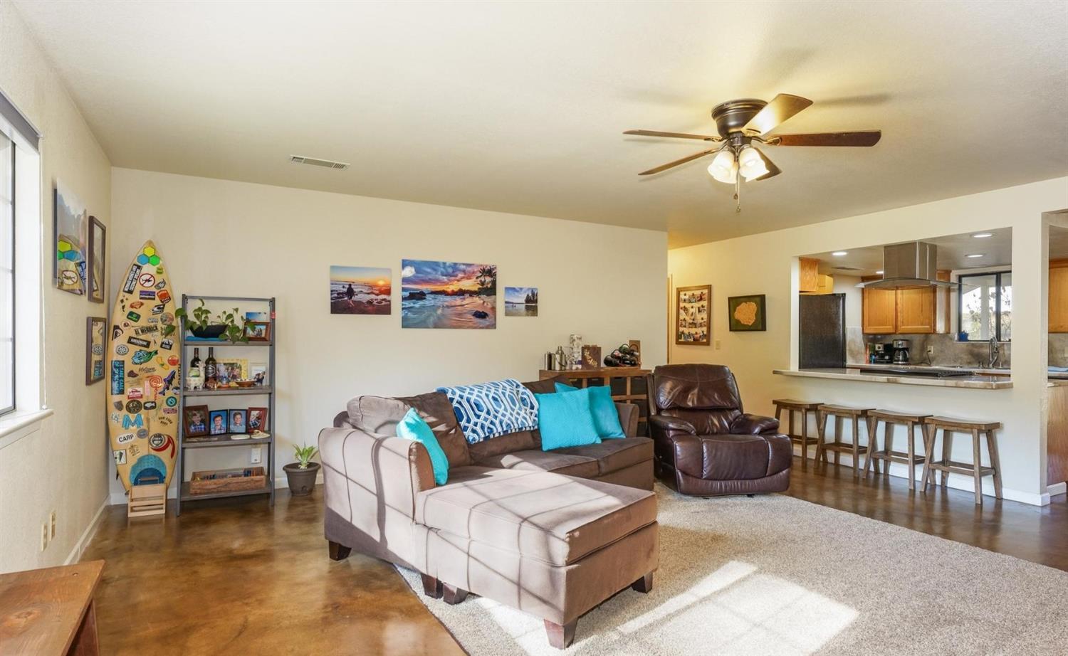40410 Goldside Drive Oakhurst, CA 93644 - Photo 4 of 24 a living room with furniture and wooden floor